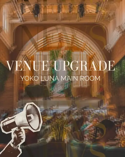 A hand holds a megaphone in front of a candlelit, arched dining hall. Venue upgrade: Yoko Luna main room.